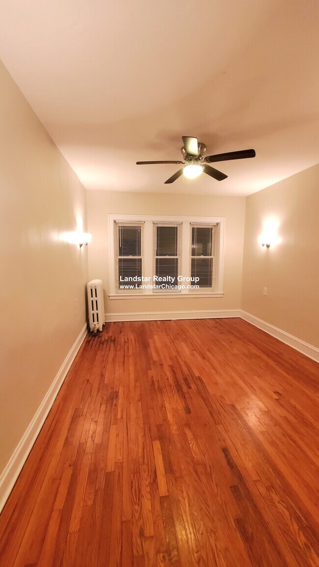 Building Photo - 1366 W Estes Ave Unit 2S