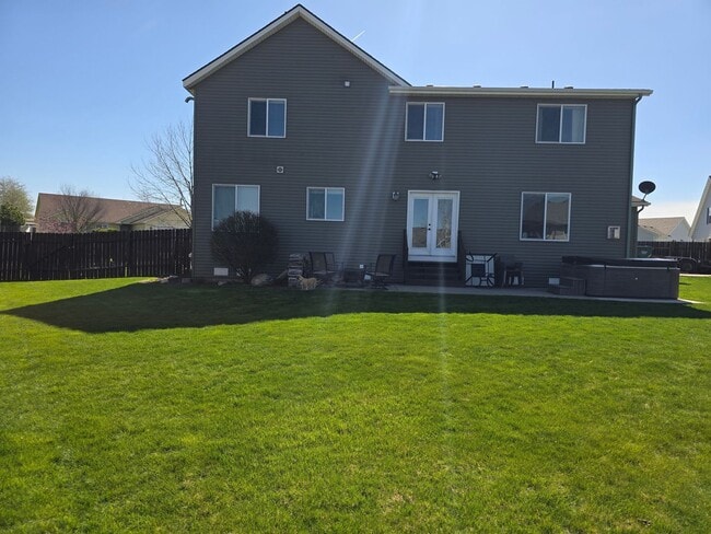 Photo - Beautiful 5 bedroom 2.5 bath home with 3 car garage and an additional Custom Shop in Post Falls!