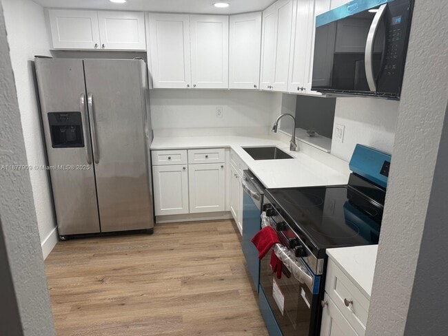 Building Photo - 8420 SW 133rd Avenue Rd Unit 315