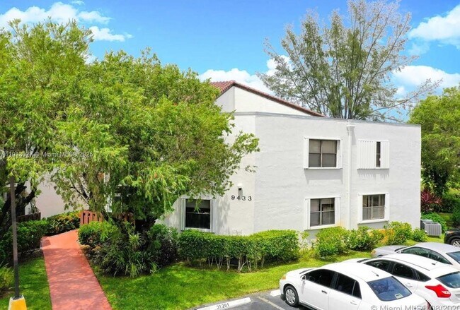 Building Photo - 9409 Fontainebleau Blvd Unit 207