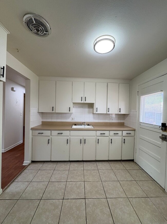 Building Photo - 7557 W 8th Pl Unit 7557