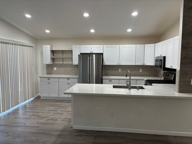 Photo - Freshly Remodeled 4 bedroom in Red Rock- RV Parking, low maintenance yard and pets welcome!