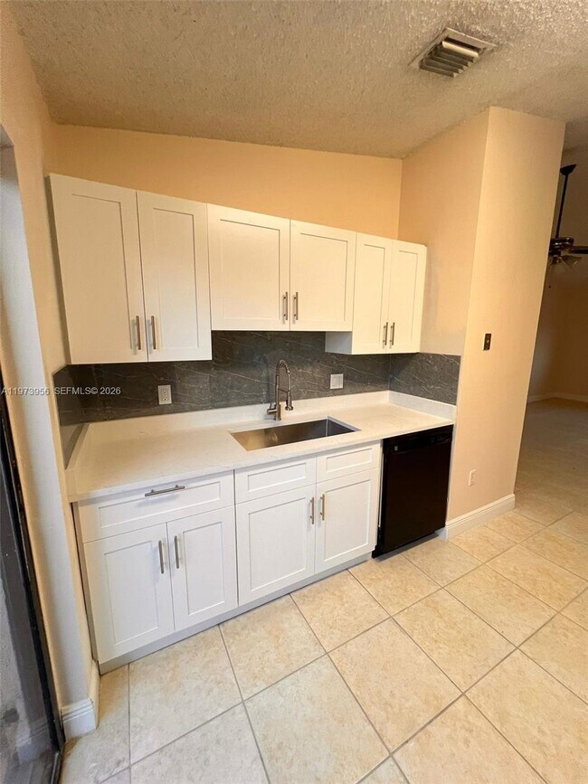 Photo - 7735 W 29th Way Unit 202
