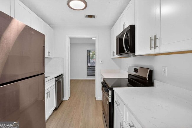 Photo - 8740 Roswell Rd Unidad 9C