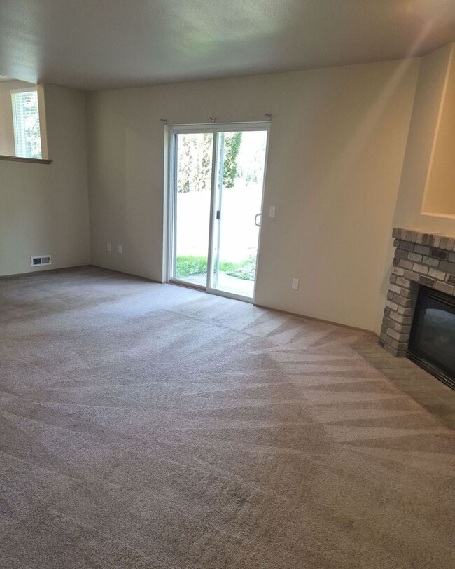 Photo - Spacious 3BD/2.5BA in Puyallup | 2-Car Garage + Private Fenced Yard
