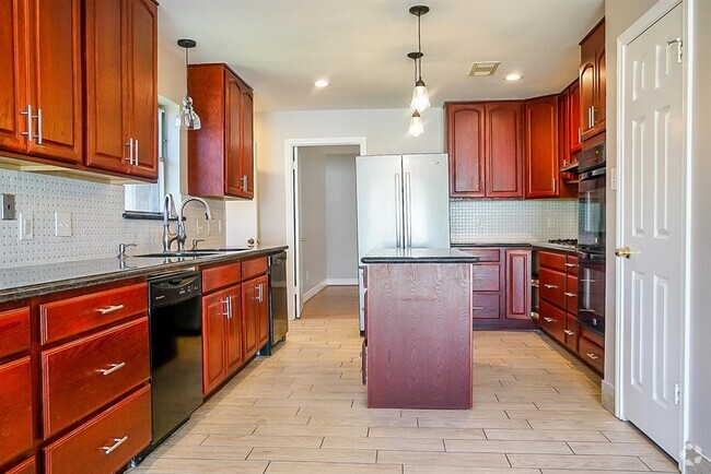 Building Photo - 7626 Coachwood Dr Rental