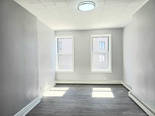 Photo - 56-46 Myrtle Ave Unit 3