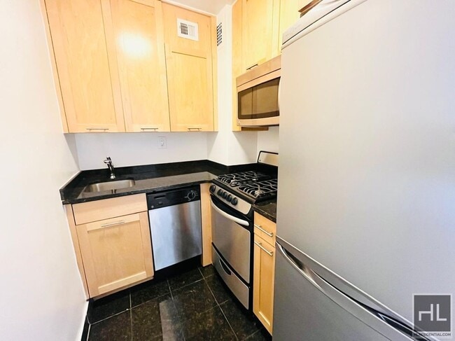 E 36th St | Alcove Studio | In-building laundry