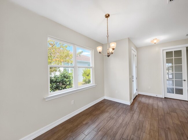 Building Photo - Live the Southwest Florida lifestyle in this lakefront villa in South Naples!