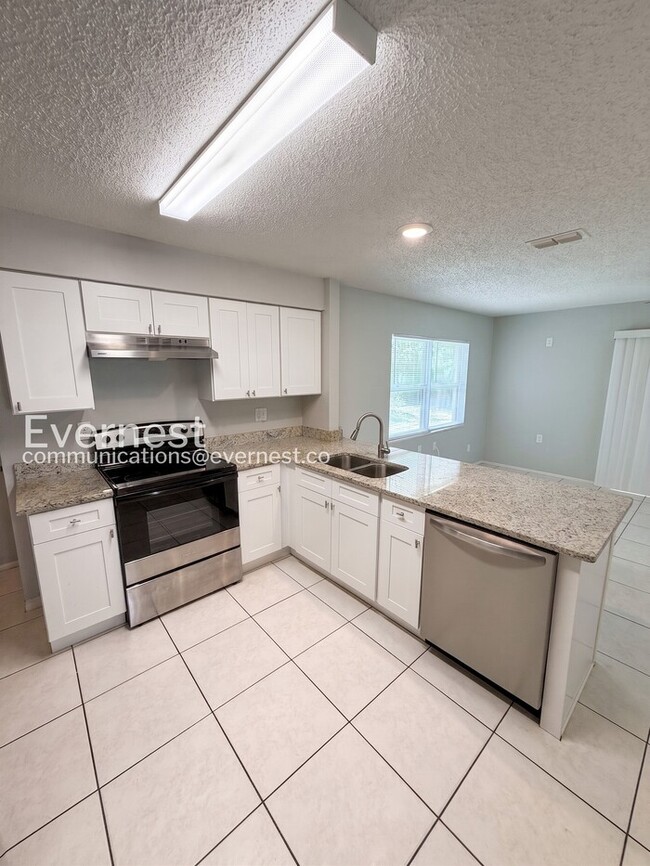 Photo - 3 Bed, 2 Bath Home with Spacious Yard and Attached Garage for Rent / Available Soon!