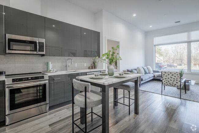 2BR, 2BA - 1,005SF - Kitchen and Living Room
