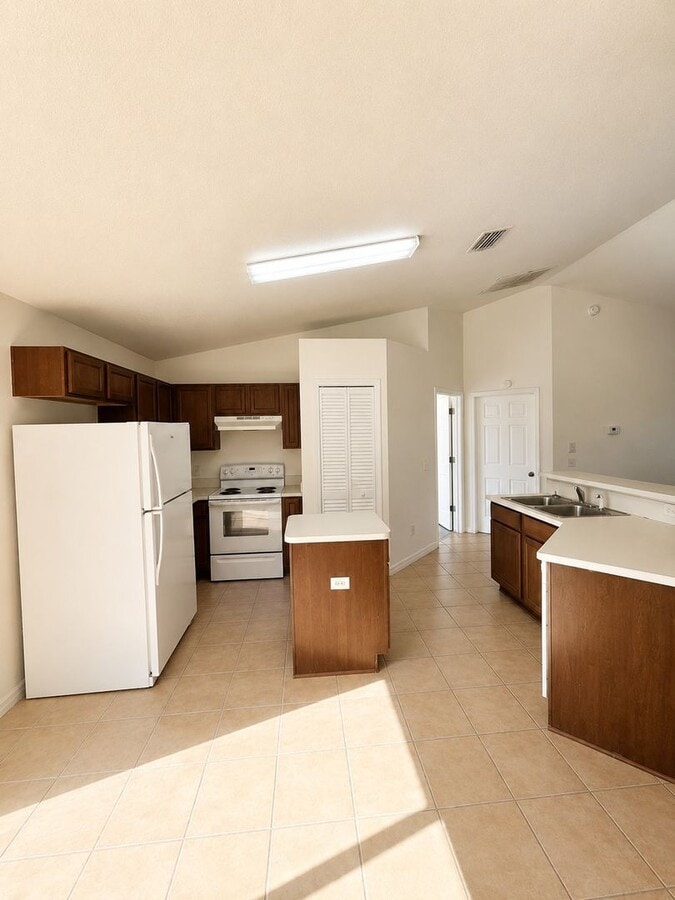 Photo - Move-In Ready 3-Bedroom Home with Vaulted Ceilings, Open Floor Plan & Two-Car Garage in Silver Sp...