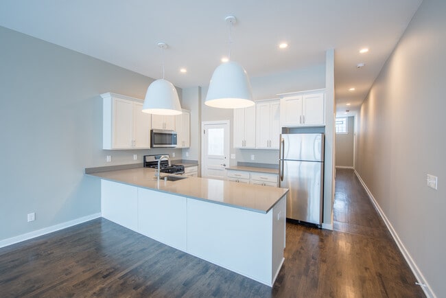 Building Photo - 3052 S Delaware Ave Unit 3048