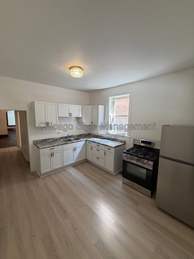 Building Photo - 5734 S Loomis Blvd Unit 1