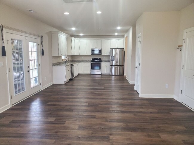 Photo - Luxurious 4BR/2.5BA Home with Spacious Living Spaces and Elegant Touches