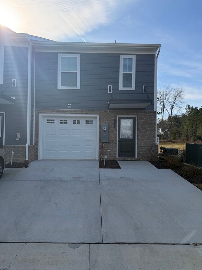 Photo - Modern Two-Story Townhome with Open Floor Plan and Garage