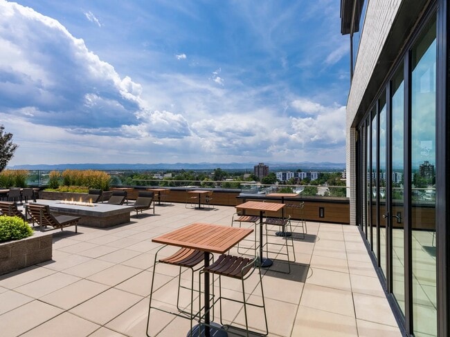 Take in the city and mountain views from this rooftop terrace, designed with multiple seating areas and a cozy fire pit.