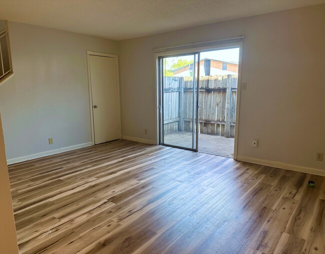 Living room with large storage closet - 2303 Mission Hill Dr Townhome