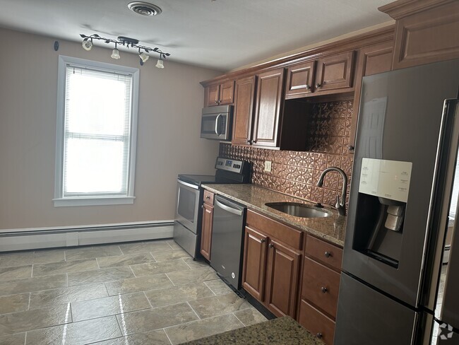 Kitchen with tile floor - 147 Barrett St Unit #2 Rental