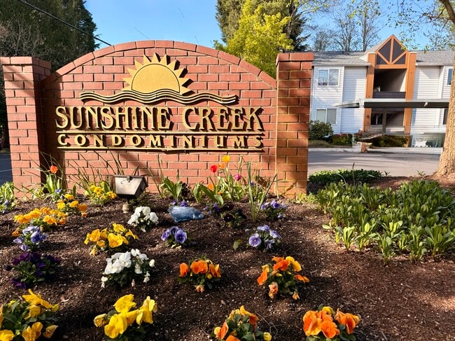 Entry monument with unit #3 in background - 10620 SW Davies Rd Unit #3