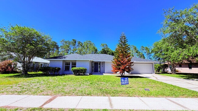 Photo - Bright & Spacious 3/2 Home with Huge Yard + Screened Patio — Lawn Care Included!