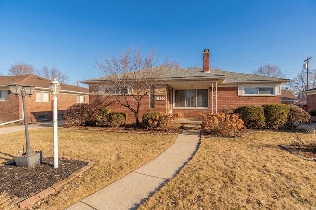 Building Photo - Generous Living on a Quiet Street, 4BR Brick Home with 2-Car Garage