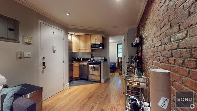 Building Photo - 411 E 12th St Unit 3 Rental