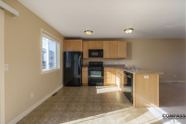 Photo - SPACIOUS TOWNHOME CONVENIENTLY LOCATED WITH IN-UNIT LAUNDRY