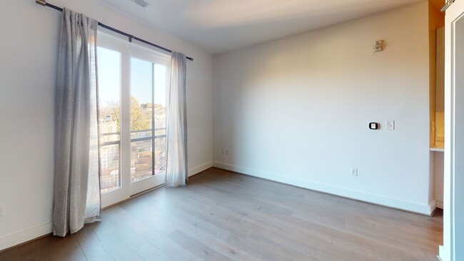 Photo - Updated Junior One Bedroom W/Full Sized Washer/Dryer, Large Bathroom, Spacious Kitchen, & More!