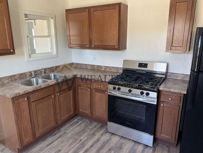 Photo - Freshly Remodeled 2 Bedroom 1 Bath Home for Rent
19 W Michigan Dr Unit A,Tucson, AZ 85714
$950 / ... Unidad A