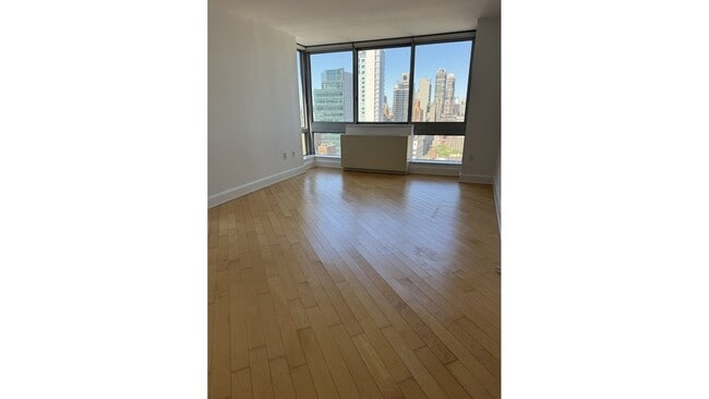 Building Photo - 231-235 E 55th St Unit 36B