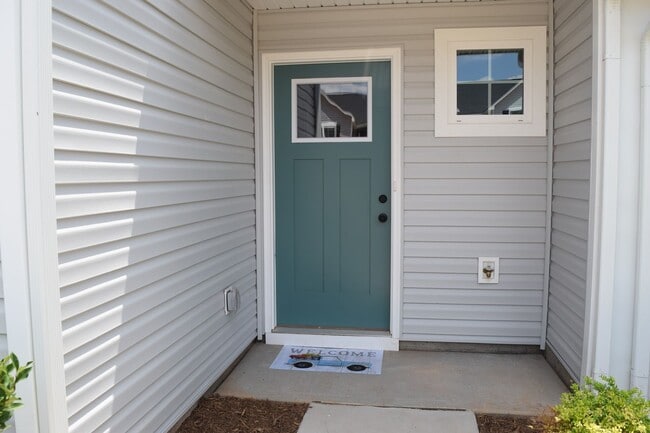 Photo - Modern 3-Bedroom Townhouse with Garage & Private Patio