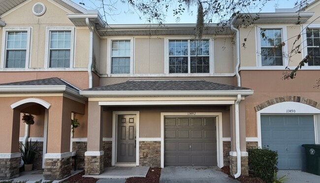 Building Photo - Gated Townhome in Bartram Park. Screened in Lanai overlooking a Nature View. Reduced Application ...