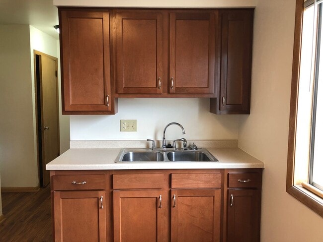 Photo - Modern, comfortable townhome living just steps from the Fox River and Oshkosh’s lively downtown.