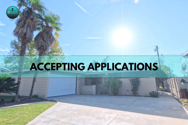 Building Photo - Mid-Century Modern Beauty with Spacious Backyard