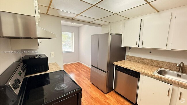 Building Photo - 5987 Forest Hill Blvd Unit 205 Rental