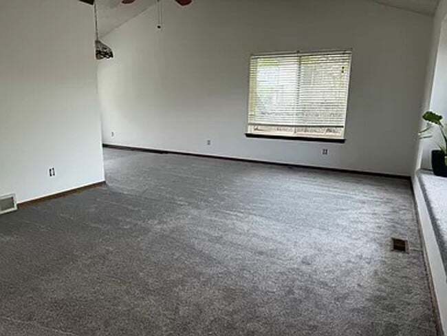 Photo - 4BR/4BA Updated Home with Finished Basement Suite & Landscaped Yard