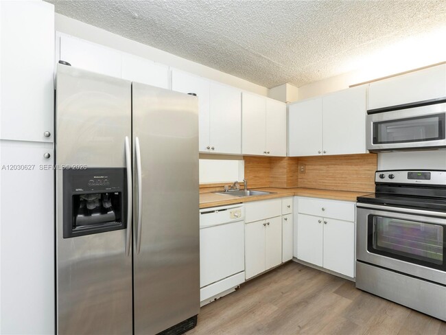 Photo - 6450 Collins Ave Unit 406