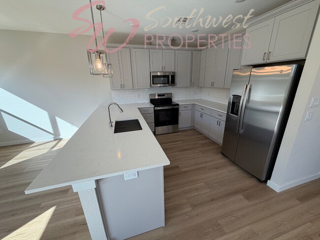 Photo - FOUR bedroom townhome. Can't get any closer to campus than this!