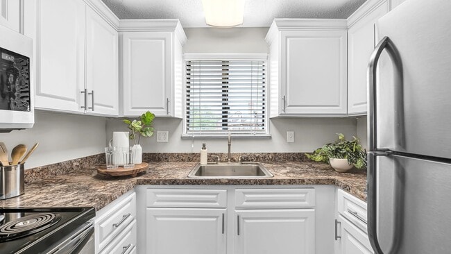 You'll enjoy our newly updated kitchens featuring a built-in pantry area and a dishwasher.