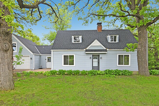 Adorable front exterior with a fresh new roof door, and windows- full of charm and ready to welcome - 32584 River Vista Ln