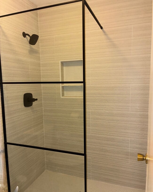 en-suit fully renovated walk-in shower - 1405 Vicksburg Plz Unit 1405