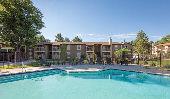 Relax by the pool - Creekside Apartments