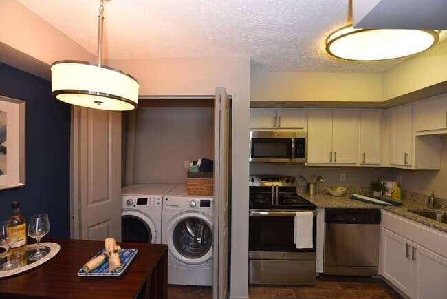 Kitchen, dining area, & laundry room