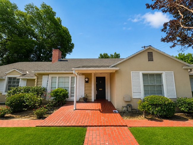 Building Photo - Experience Spacious and Upgraded Living in this 4BD / 3BA San Marino Home with a Private Pool!