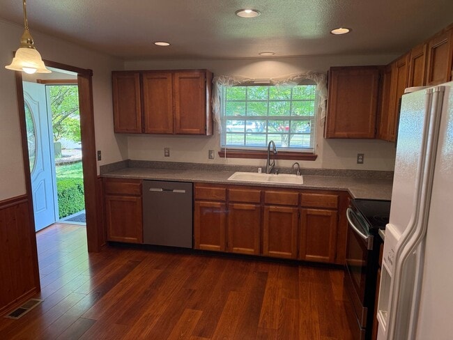 Photo - Beautiful 3 Bedroom Ranch Style House with 2 Car Garage, Fences Yard, Fireplace, Shed, Workshop &...