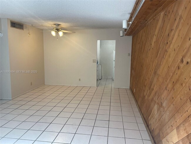 Building Photo - 10818 Royal Palm Blvd Unit 10818