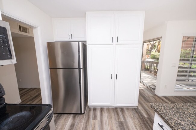 Photo - Move in Special: Spacious Downstairs Unit 3BR/2BA - 1/2 off FIRST Month Rent. Unit 101