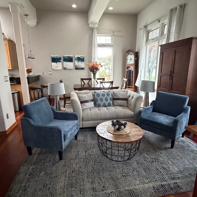 Living room, dining room, kitchen, half bath and bbq grill deck on main floor