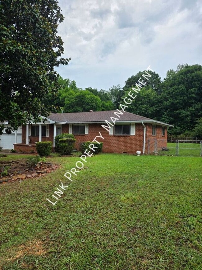 Building Photo - COMING SOON July 24th! Don't miss this 3 Bedroom 1.5 Baths with Garage, Fenced Backyard, Den and...